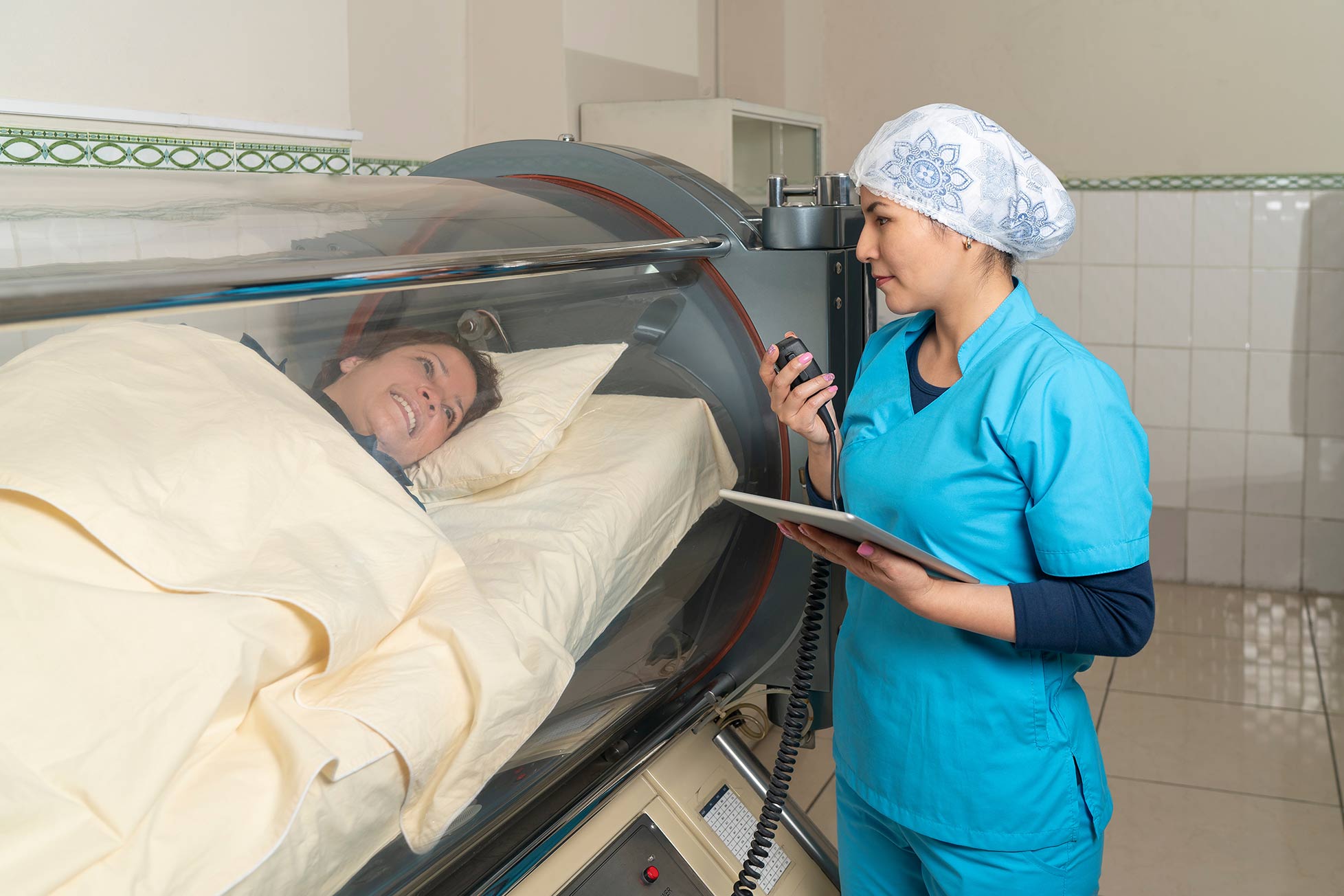 Hyperbaric Oxygen Therapy woman in chamber with nurse